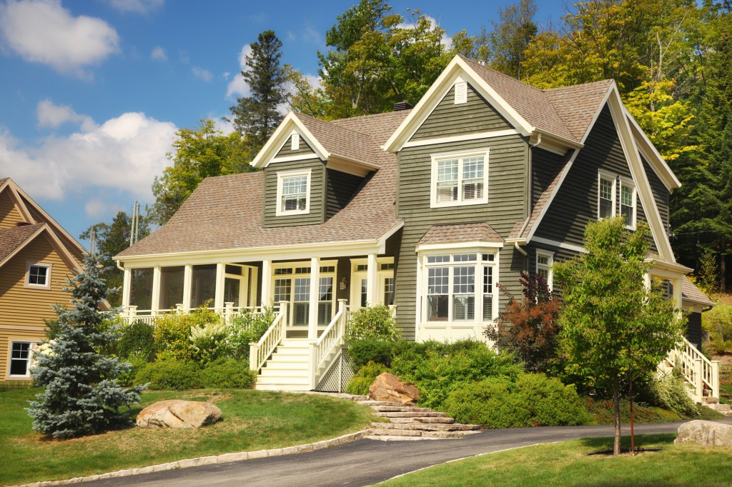 A quiet green country house with roads and trees